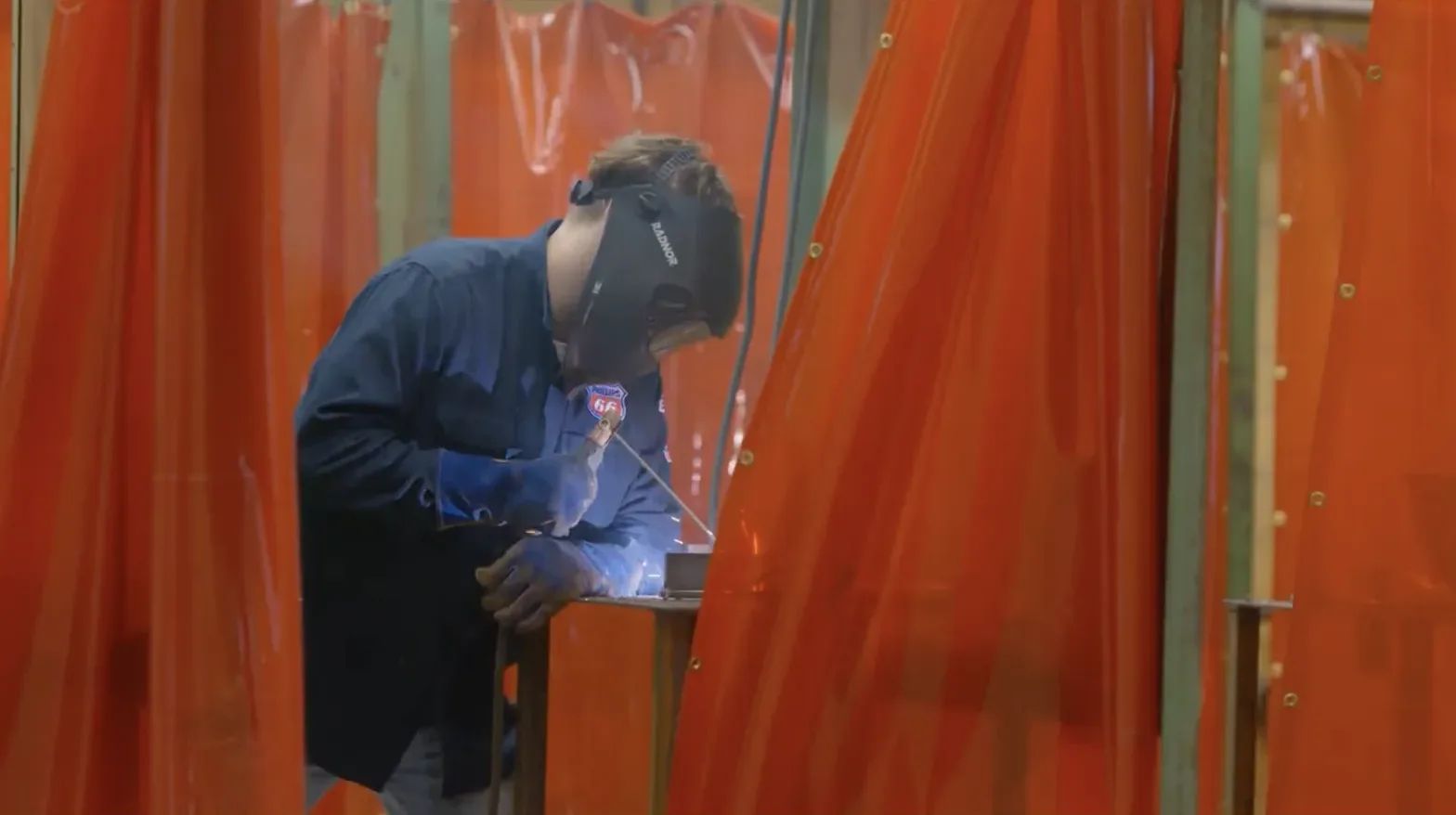 Student practicing welding in a career and technical education class