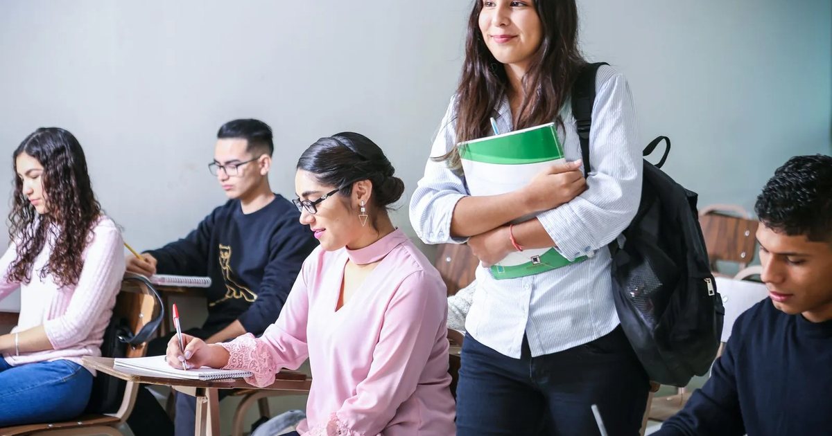 High school students working at their desks in a classroom